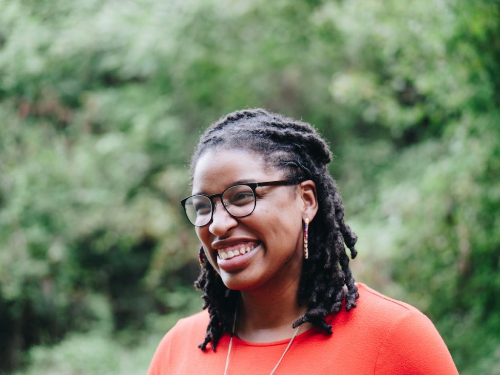 Woman smiling. 8-Hour Anger Management Workshop Orlando Anger Management